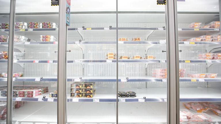 Empty shelves are seen in the meat aisle of Co-Op supermarket, Harpenden, Britain, September 22, 2021. 
