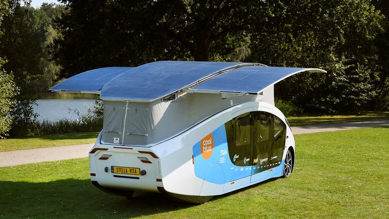 Stella Vita, the solar-powered driving house by students team Solar Team Eindhoven. With the roof folded out this Self-sustaining House On Wheels has 17,5 m2 of solar panels, enough for driving and living. On a full battery and a sunny day it could reach 730 kms.

Credit: STE / Bart van Overbeeke