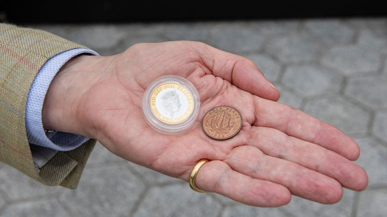 Richard Woodman-Bailey with the new £2 Britannia coin he&#39;ll place. Pic: Royal Mint