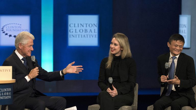 Former U.S. President Bill Clinton speaks with Jack Ma, executive chairman of Alibaba Group, and Elizabeth Holmes, CEO of Theranos, during the Clinton Global Initiative&#39;s annual meeting in New York
