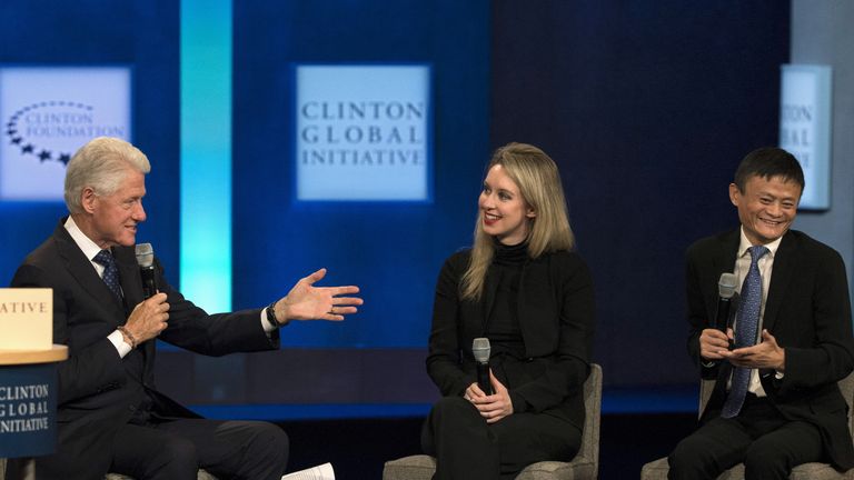 Former U.S. President Bill Clinton speaks with Jack Ma, executive chairman of Alibaba Group, and Elizabeth Holmes, CEO of Theranos, during the Clinton Global Initiative&#39;s annual meeting in New York