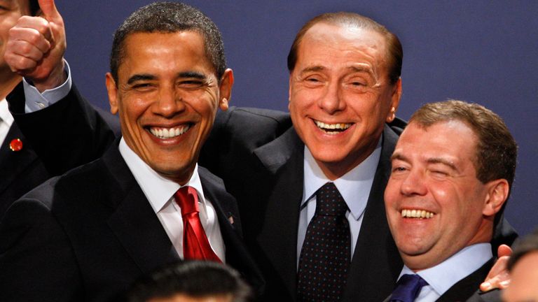 FILE -- In this Thursday April 2, 2009 file photo, Italian Prime Minister Silvio Berlusconi gives the thumbs up, while posing with U.S. President Barack Obama, left, and Russian President Dmitry Medvedev during a group photo at the G20 Summit in London. The Italian edition of Rolling Stone magazine said it named Berlusconi for a "lifestyle worthy of the greatest rock stars." 
PIC:AP