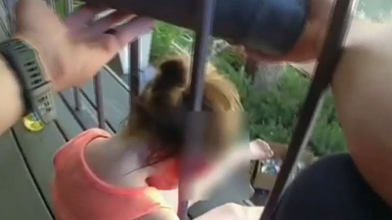 Toddler is recued after getting head stuck in railings