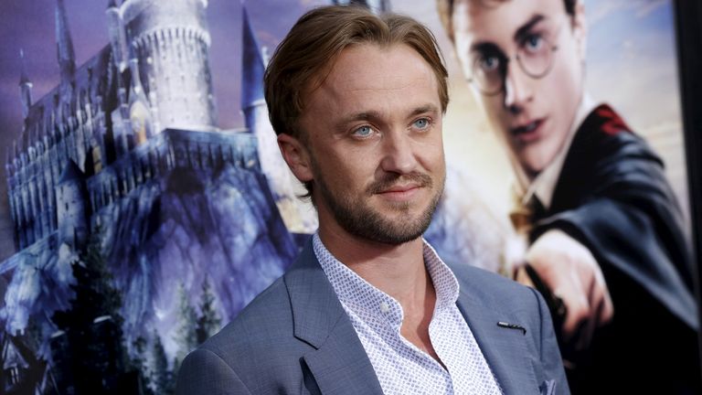 Actor Tom Felton poses for a special preview opening of "The Wizarding World of Harry Potter" attraction at Universal Studios Hollywood in Universal City, California April 5, 2016. REUTERS/Mario Anzuoni