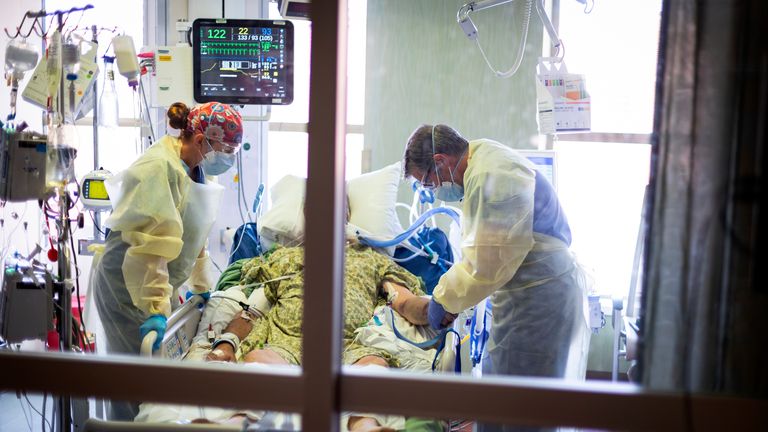 COVID-19 deaths in the US have surged to more than 1,900 a day - the highest level since early March Pic: AP