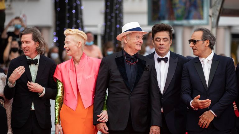 Wes Anderson, Tilda Swinton, Bill Murray, Benicio and Alexandre Desplat pose for photographers upon arrival at the premiere of the film &#39;The French Dispatch&#39; at the 74th international film festival, Cannes, southern France, Monday, July 12, 2021. (Photo by Vianney Le Caer/Invision/AP)