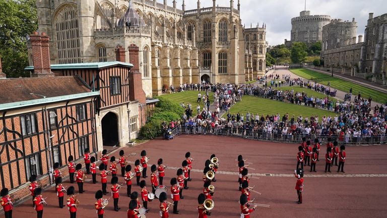 Guards at Windsor Castle played the US national anthem in tribute