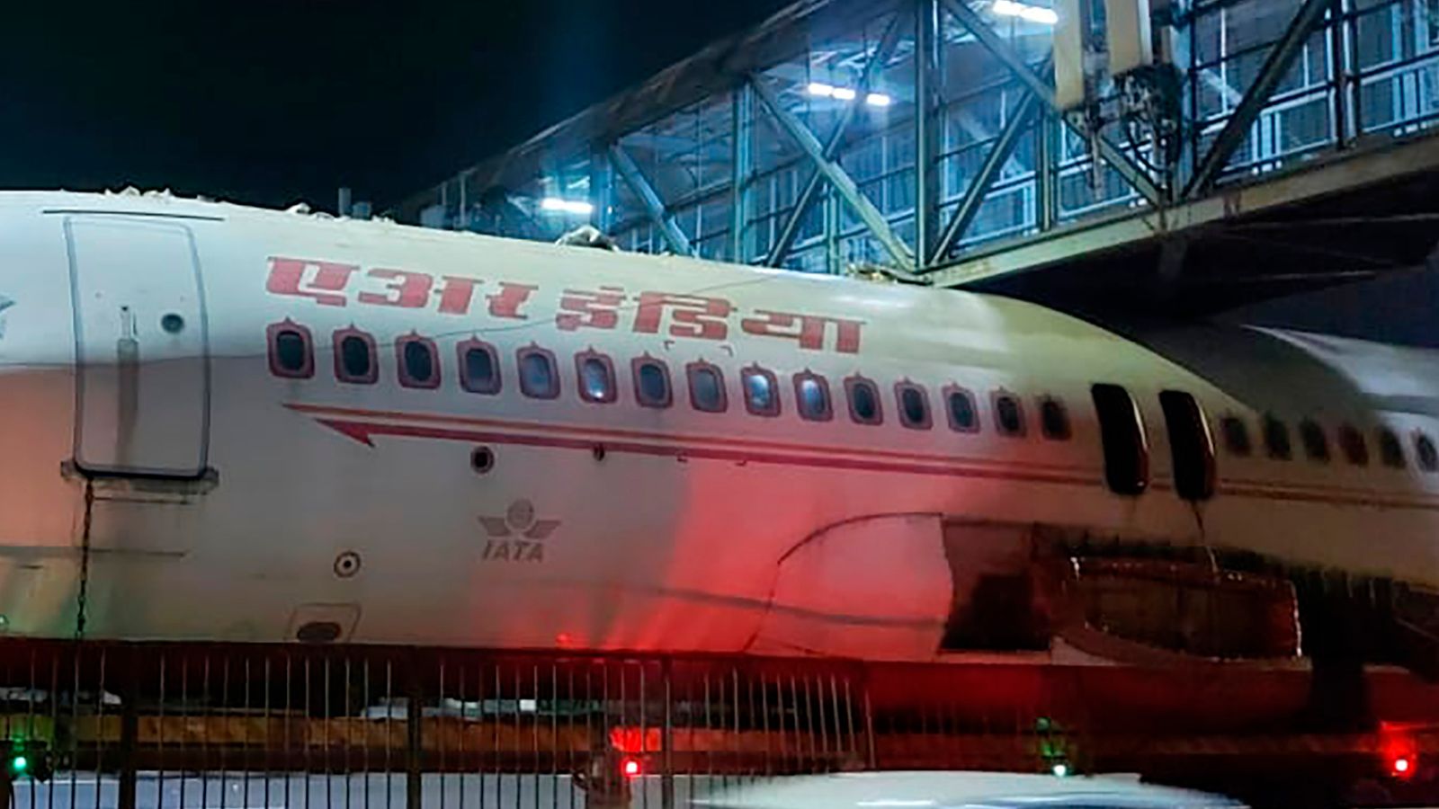 Air India plane gets stuck under bridge during transportation World
