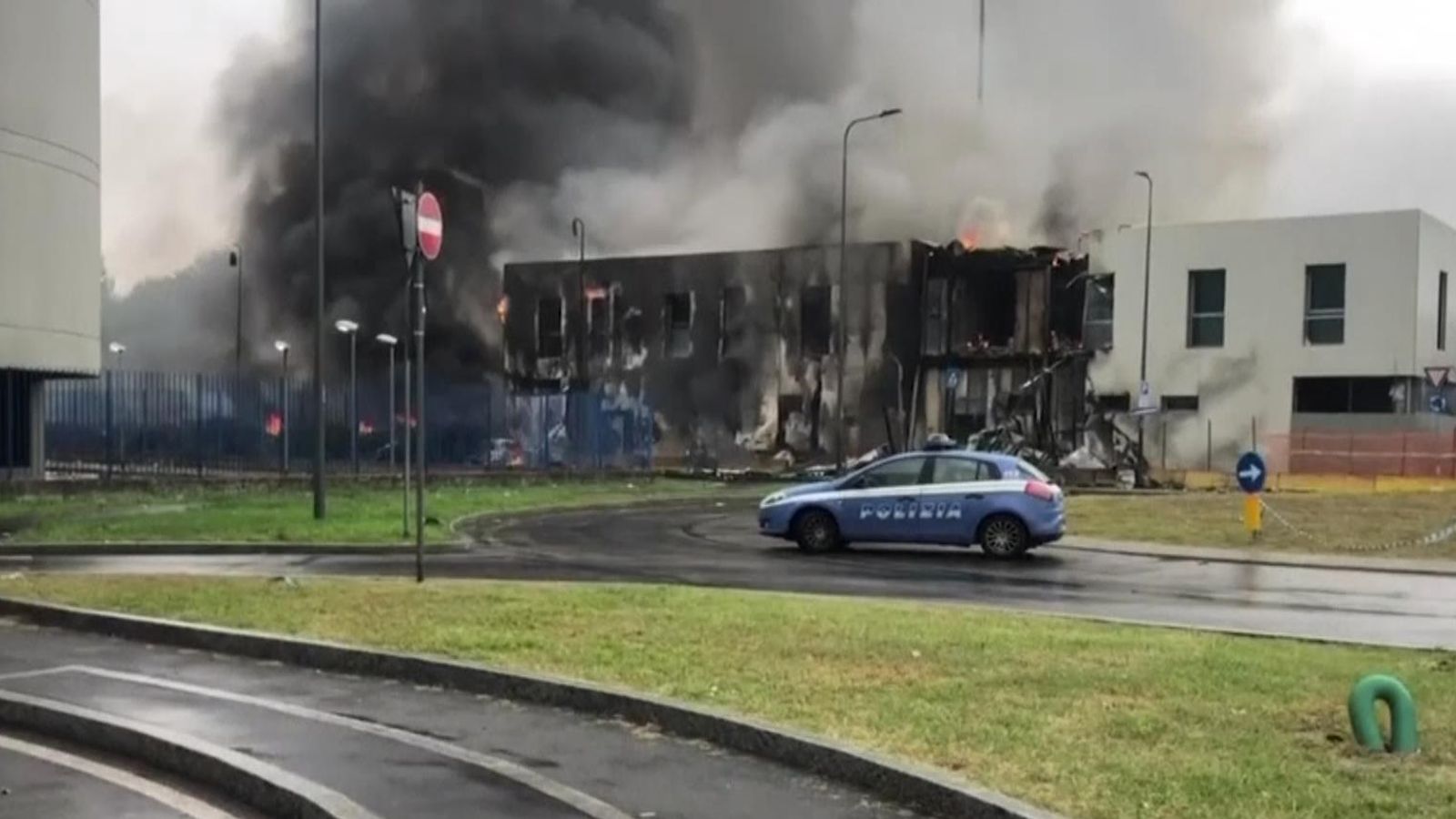 Italy Firefighters tackle blaze at the site of plane crash World