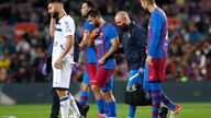 Soccer Football - LaLiga - FC Barcelona v Deportivo Alaves - Camp Nou, Barcelona, Spain - October 30, 2021 FC Barcelona&#39;s Sergio Aguero leaves the pitch after sustaining an injury REUTERS/Albert Gea

