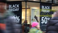 Shops in Canterbury, Kent, display offer posters ahead of Black Friday sales. 22/11/2018