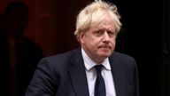 Britain&#39;s Prime Minister Boris Johnson walks outside Downing Street, following the death of British MP David Amess who was stabbed to death during a meeting with constituents, in London, Britain, October 18, 2021. REUTERS/Henry Nicholls  