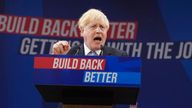 Britain&#39;s Prime Minister Boris Johnson gestures as he makes his keynote speech at the Conservative party conference in Manchester