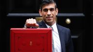 Britain&#39;s Chancellor of the Exchequer Rishi Sunak holds the budget box outside Downing Street in London, Britain, October 27, 2021. REUTERS/Peter Nicholls  
