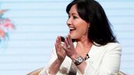 Cast member Shannen Doherty applauds during a panel for the Fox television series "BH90210" in 2019