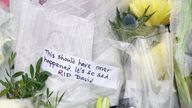 Flowers and tributes at the scene where Conservative MP Sir David Amess died