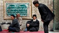 Uighur men attend Friday prayers at the Altyn Mosque in Yarkand, Xinjiang