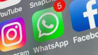 London, UK - August 02, 2018: The buttons of WhatsApp, Facebook, Instagram, Snapchat and Youtube on the screen of an iPhone.
