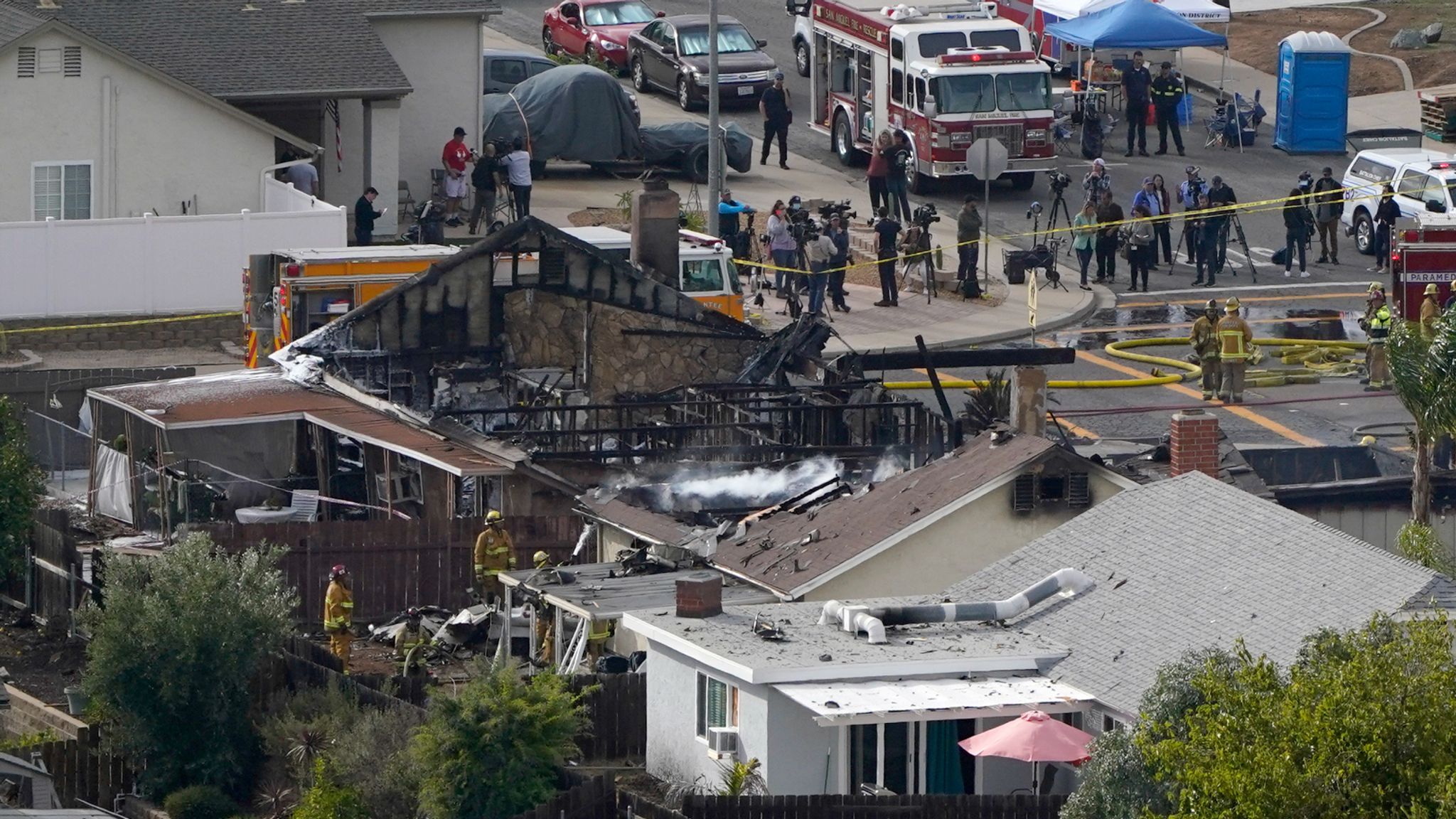 At least two people killed in plane crash near San Diego as homes