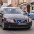 FKKN2J An unmarked police car flashes its blue lights as it speeds through Burford , Oxfordshire , England , Britain , Uk