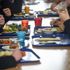 Students eat their school dinner from trays and plates during lunch in the canteen at Royal High School Bath, which is a day and boarding school for girls aged 3-18 and also part of The Girls' Day School Trust, the leading network of independent girls' schools in the UK.