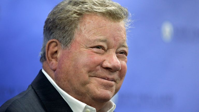 FILE - In this May 6, 2018 file photo, actor William Shatner takes questions from reporters after delivering the commencement address at New England Institute of Technology graduation ceremonies, in Providence, R.I. Star Trek&#8217;s Captain Kirk is rocketing into space this month &#8212; boldly going where no other sci-fi actors have gone. Jeff Bezos&#8217; space travel company, Blue Origin, announced Monday, Oct. 4, 2021 that Shatner will blast off from West Texas on Oct. 12.  (AP Photo/Steven Senne, file)