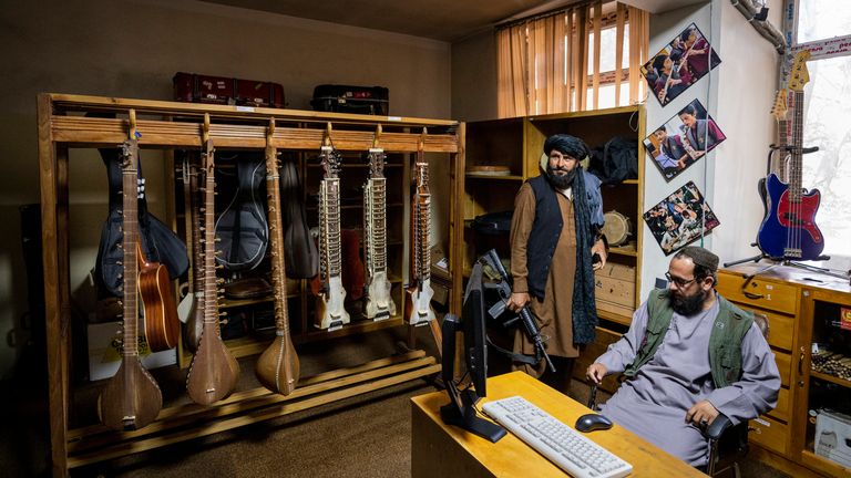 Fighters from the Haqqani network appear inside a room of the Afghanistan National Institute of Music in Kabul, Afghanistan, in September 2021. The institute was once famous for its inclusiveness and emerged as the face of a new Afghanistan. Now, it is guarded by fighters from the Haqqani network, an ally of the Taliban considered a terrorist group by the United States. Pic: AP Photo/Bernat Armangue
