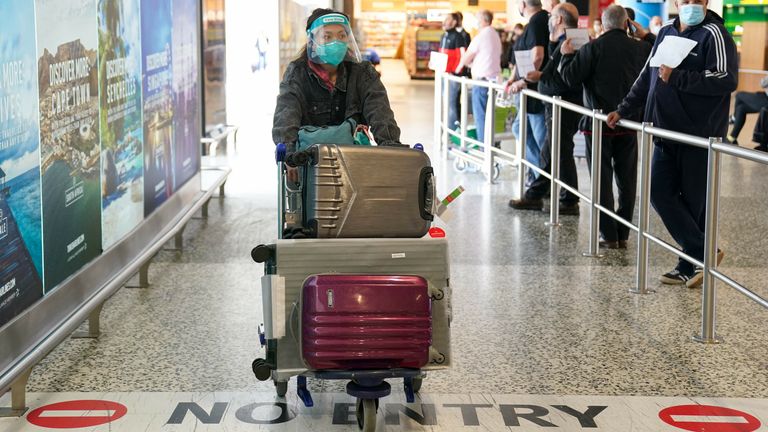 Passengers arriving at Birmingham Airport, as forty-seven countries were removed from the red list, meaning arrivals from those locations will no longer need to spend 11 nights in a quarantine hotel. Picture da