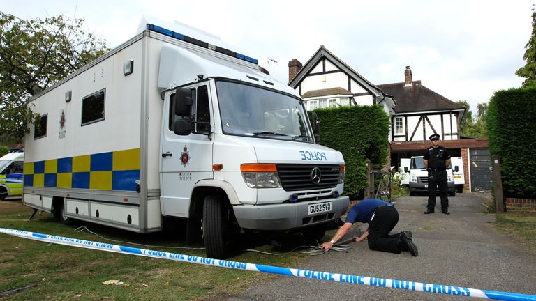 Police are pictured searching the al-Hilli&#39;s family home in Claygate, Surrey in 2012 