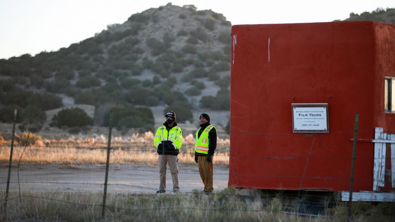 Security guards stand near the entrance to Bonanza Creek Ranch where Hollywood actor Alec Baldwin fatally shot a cinematographer and wounded a director when he discharged a prop gun on the movie set of the film "Rust" in Santa Fe, New Mexico, U.S., October 22, 2021. REUTERS/Adria Malcolm
