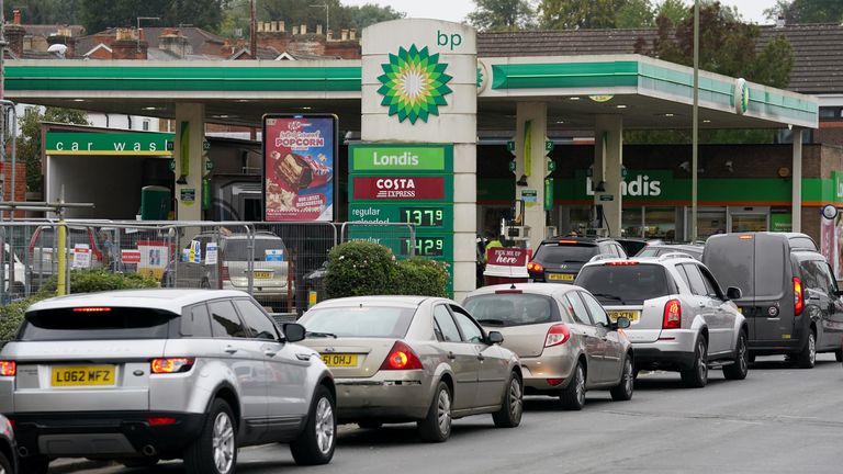Vehicles queue up outside a BP petrol station in Alton, Hampshire. Picture date: Thursday September 30, 2021.