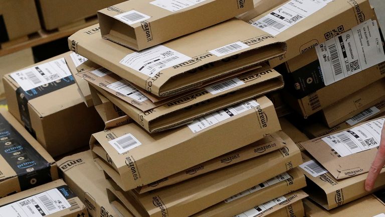 A worker sorts parcels at Amazon&#39;s fulfilment centre in Peterborough, Britain November 15, 2017. REUTERS/Darren Staples
