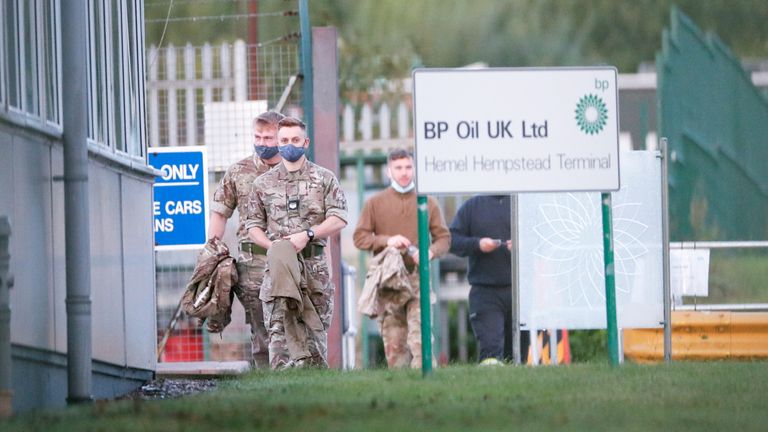 Members of the military march at the Buncefield Oil Depot in Hemel Hempstead, Britain October 4, 2021. REUTERS / Andrew Boyers