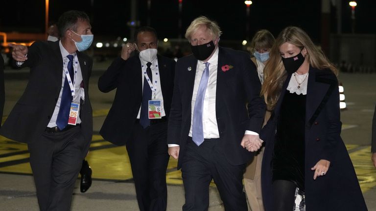 Boris Johnson and his wife Carrie arrive at Rome&#39;s Fiumicino Airport ahead of the G20 summit