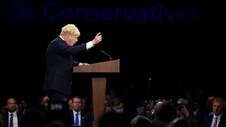 Britain&#39;s Prime Minister Boris Johnson gestures as he makes his keynote speech at the Conservative party conference in Manchester