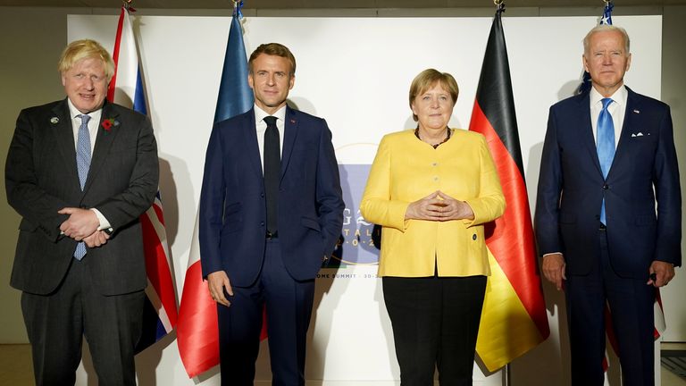 (L-R) Boris Johnson, Emmanuel Macron, Angela Merkel and Joe Biden at the G20 summit in Rome