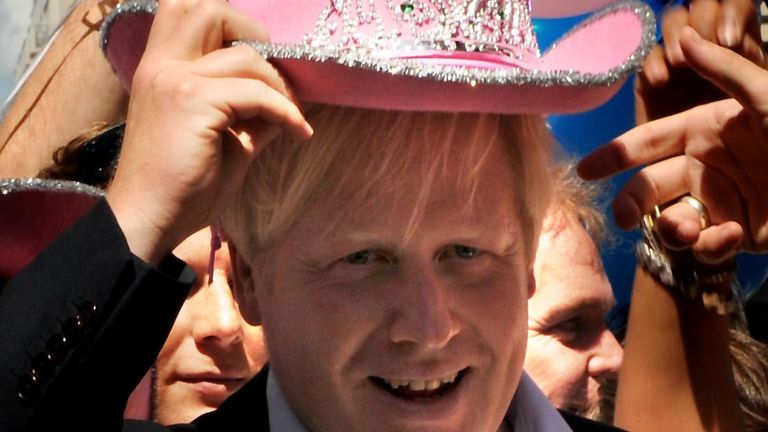 London Mayor Boris Johnson wears a pink cowboy hat at the Pride London parade in central London.