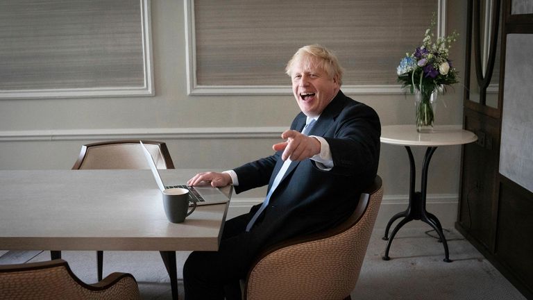 Prime Minister Boris Johnson prepares his keynote speech in his hotel room in Manchester, England, before addressing the Conservative Party Conference. Johnson ends the four-day conference on Wednesday, Oct. 6, with a speech promising that Britain will emerge from Brexit and the coronavirus pandemic as a stronger, more dynamic country — even if the road is slightly rocky.