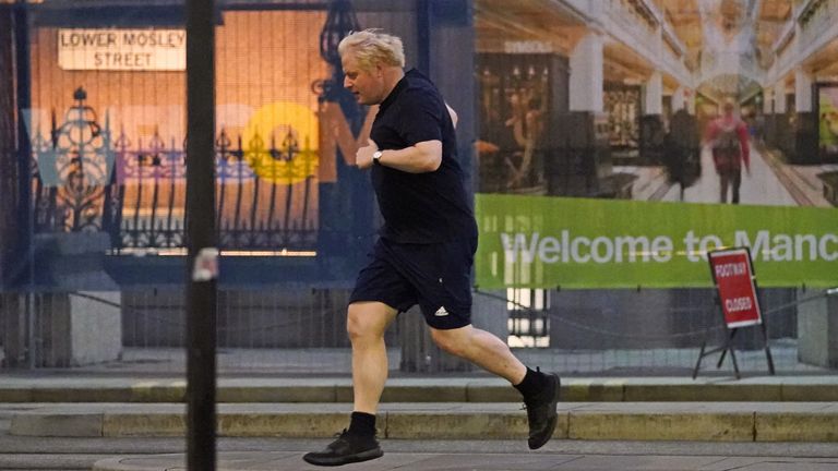 Prime Minister Boris Johnson goes for a run ahead of the day&#39;s events at the Conservative Party Conference in Manchester. Picture date: Monday October 4, 2021.