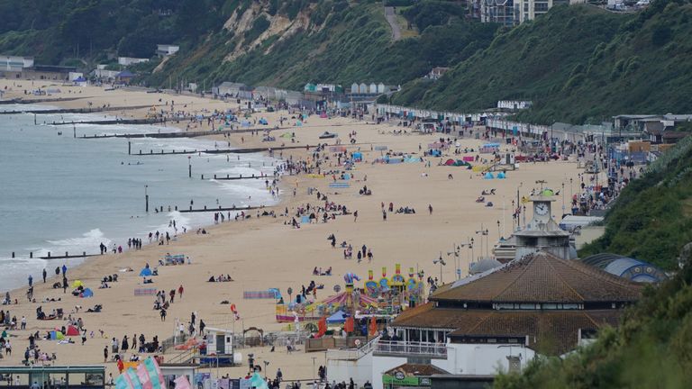 File photo dated 30/08/21 of people enjoying the Bank Holiday weather on Bournemouth beach.
