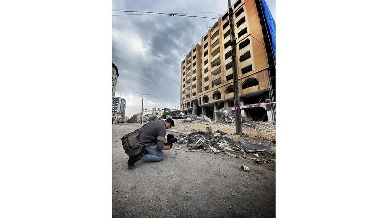 Gaza Stills for Bunkall  article
Jake filming bombed building