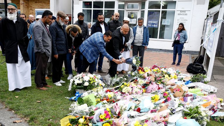 Members of the local Muslim came to pay tribute to the Sir David