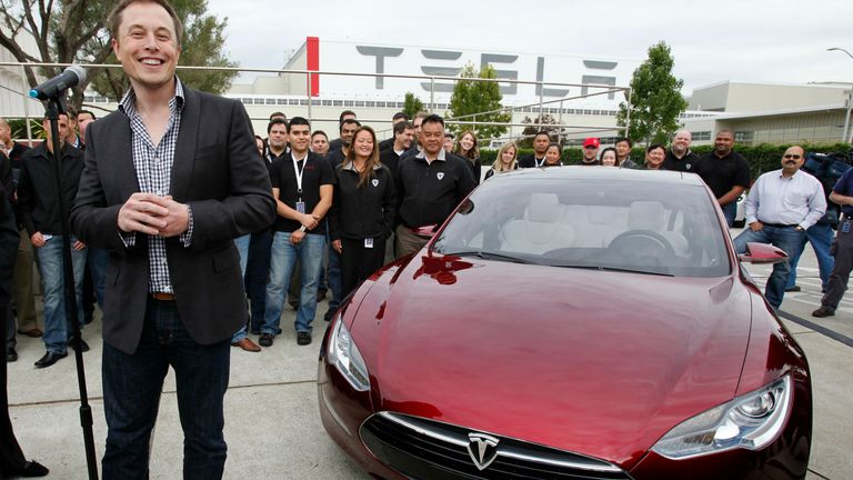 Elon Musk with a Tesla Model S. Pic: AP
