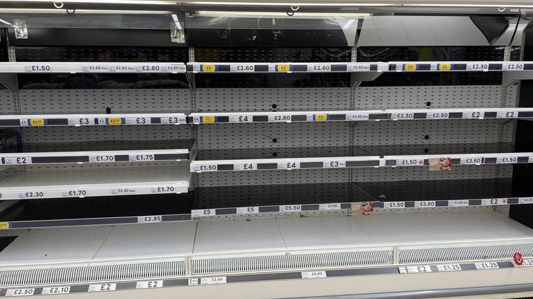 Empty shelves in the meat aisle of a branch of Tesco in Liverpool 