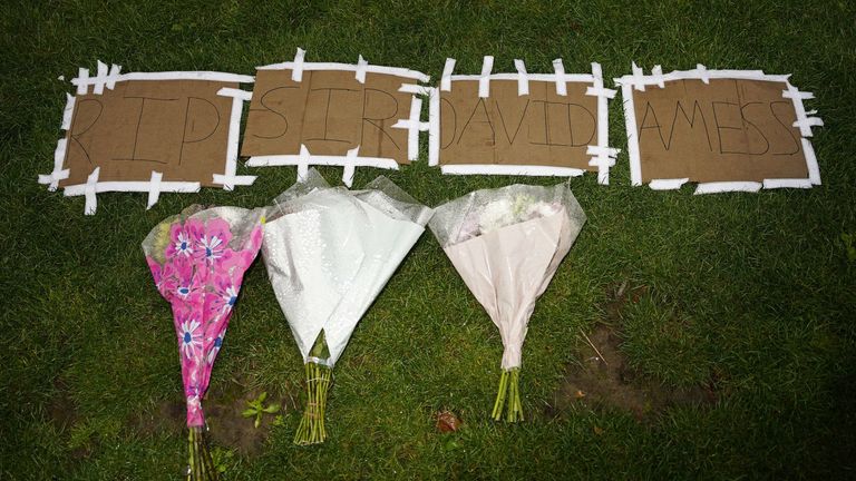 Tributes left to Sir David outside the Houses of Parliament