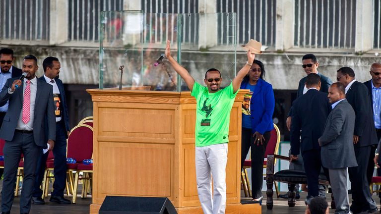 Ethiopia&#39;s Prime Minister Abiy Ahmed waves to the crowd at a large rally in his support, in Meskel Square, in 2018 