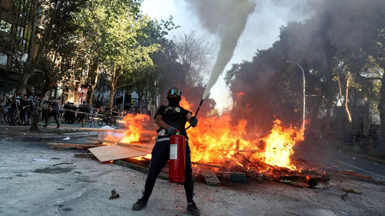 Chile Protesters Clash With Police Two Years After Landmark Uprising As Election Race Hots Up World News Sky News