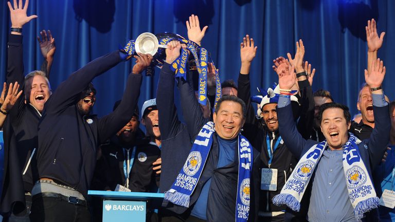 Leicester City Vice Chairman Aiyawatt Srivaddhanaprabha, right, and Chairman Vichai Srivaddhanaprabha, 2nd right, show the Premier League Trophy to fans at Victoria Park during the victory parade to celebrate winning the English Premier league title in Leicester, England, Monday, May 16, 2016. (AP Photo/Rui Vieira).
PIC:AP