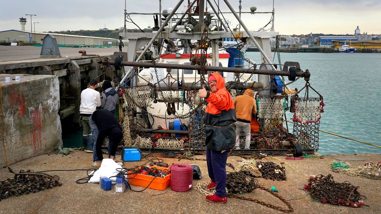 French fisherman Pierre Hagnerz prepares his boat for sea at the port of Boulogne, France. Environment Secretary George Eustice has warned France the UK could retaliate if it goes ahead with threats in the fishing row, warning that "two can play at that game". Picture date: Friday October 29, 2021.
