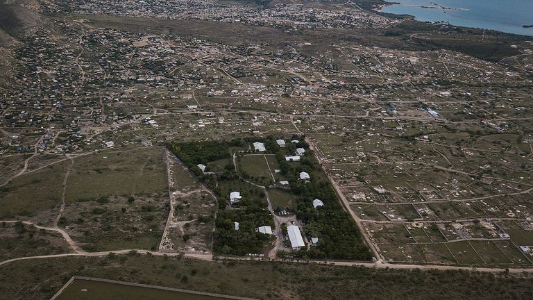 An aerial view of Christian Aid Ministries headquarters in Titanyen, Haiti, Thursday, Oct. 21, 2021. The leader of the 400 Mawozo gang that police say is holding 17 members of missionary group is seen in a video released Thursday saying he will kill them if he doesn’t get what he’s demanding. (AP Photo/Matias Delacroix)


